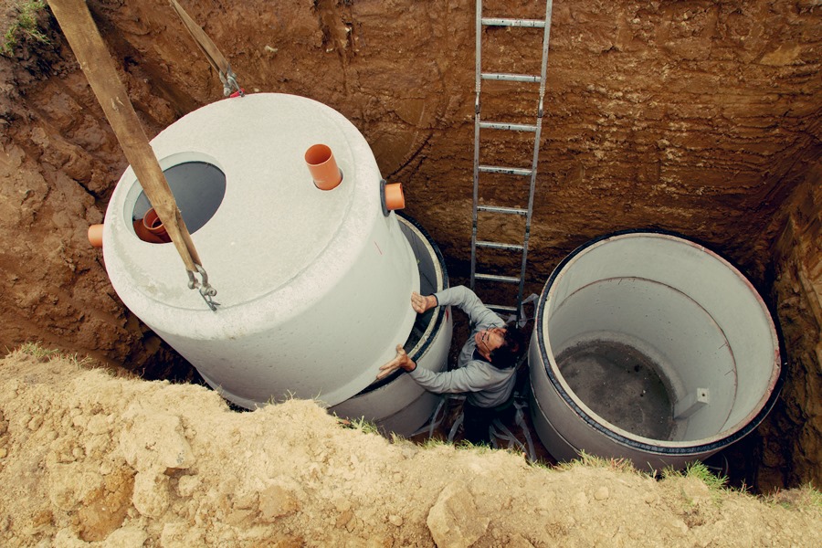 Inside the septic tank, baffles control and reroute the flow of incoming and exiting effluent.